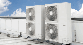 Rooftop-mounted commercial air conditioning condenser units used in large-scale HVAC systems